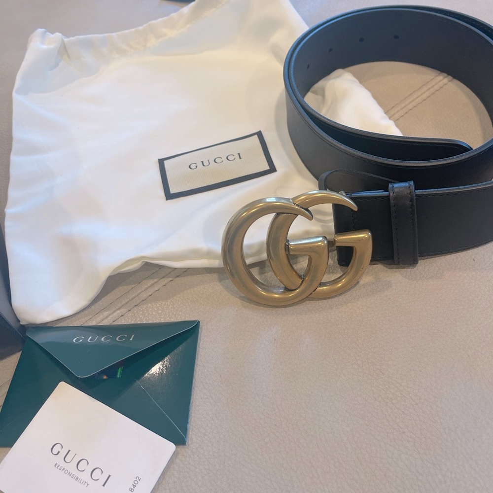 Women’s Gucci wide leather belt.